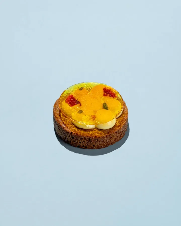Katana Kitten cookie: brown butter cookie base with yuzu, yuzu crémeux, ginger candy, yuzu gel, candied lime peel
